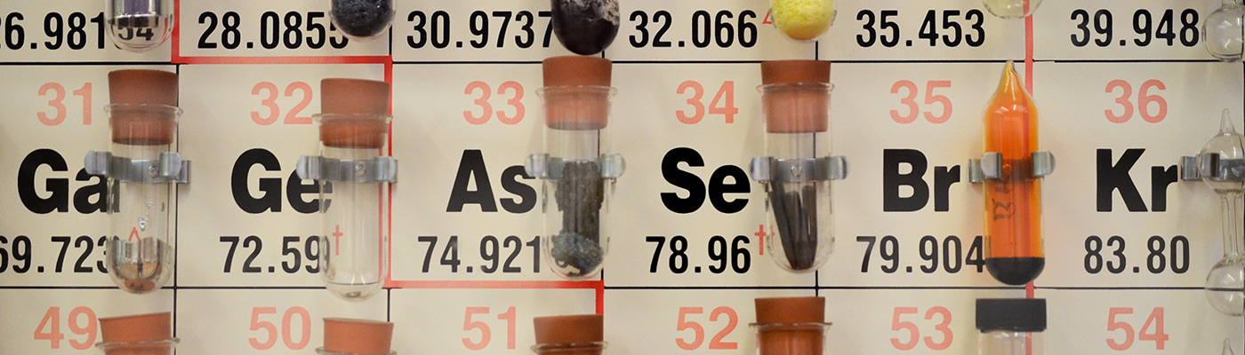 Periodic table with elements in test tubes