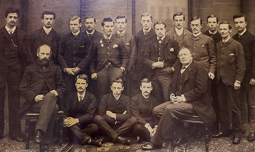 A close-up of an old photograph of people associated with chemistry at the University