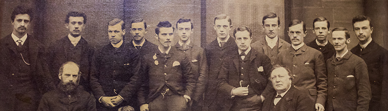 An old picture on the wall of the Chemistry Building showing former staff and students