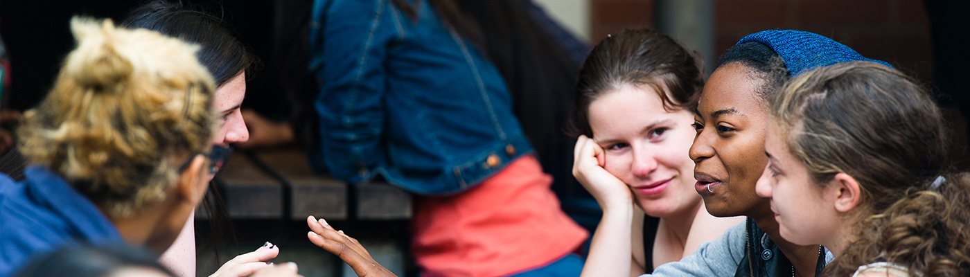 Multiple females students in conversation