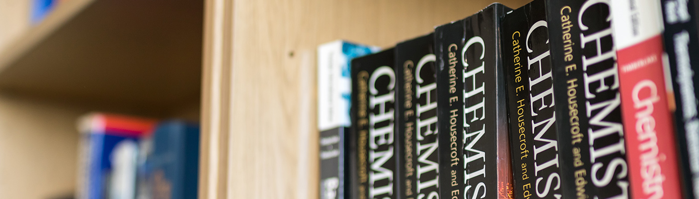 A shelf of chemistry textbooks